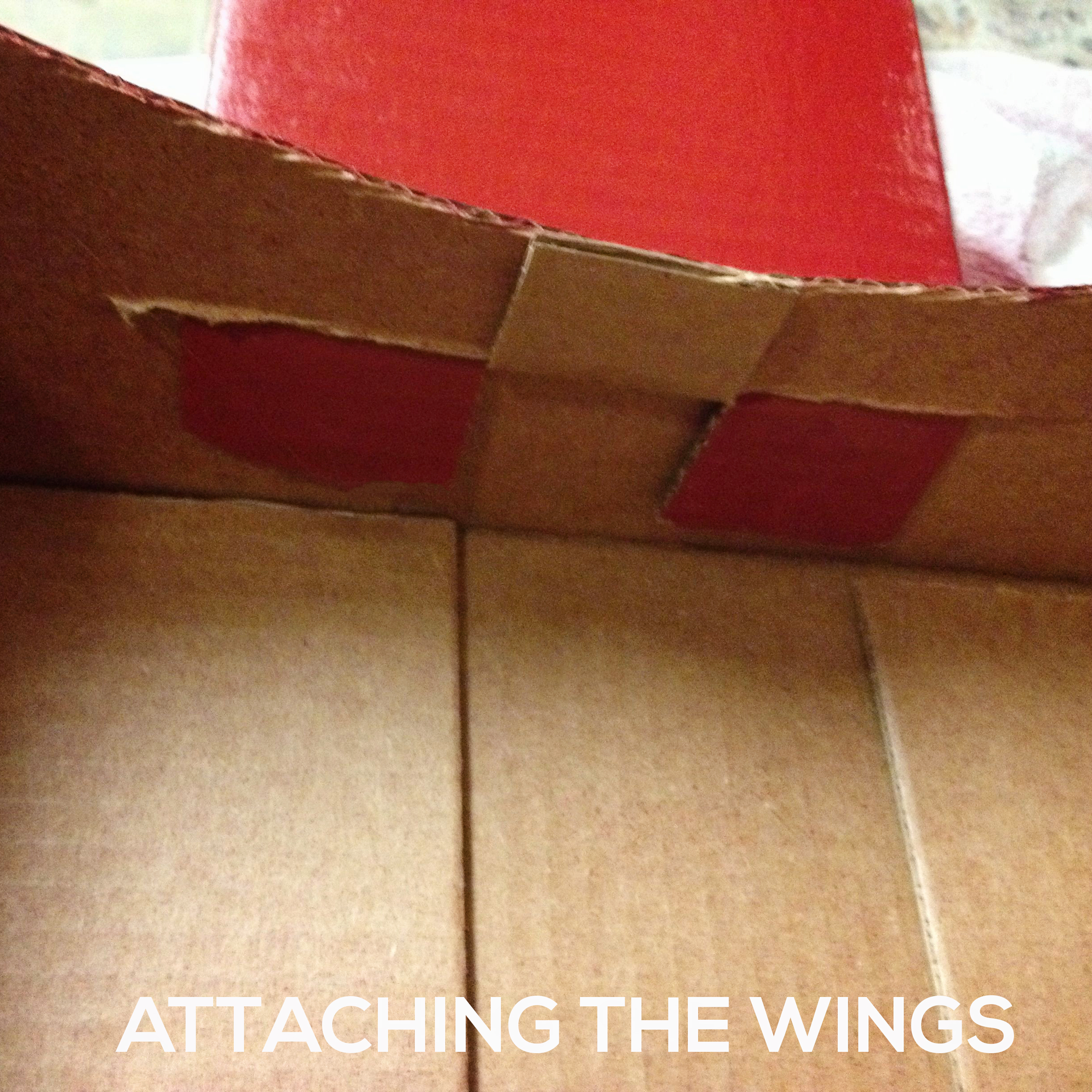 attaching-wings Make a DIY Box Airplane Prop for Newborn Photography Guest Bloggers Photography Tips  
