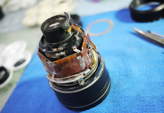 nikon-repair-center-boil-lens-ニコンが水で損傷したレンズを沸騰させて正常に修理する前にニュースとレビュー